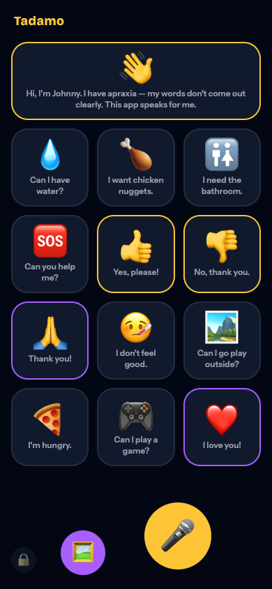 The Tadamo talking board: a grid of emoji phrase tiles like 'Can I have water?', 'I'm hungry.' and 'I love you!', an intro tile reading 'Hi, I'm Johnny. I have apraxia — my words don't come out clearly. This app speaks for me.', and a large golden microphone button.